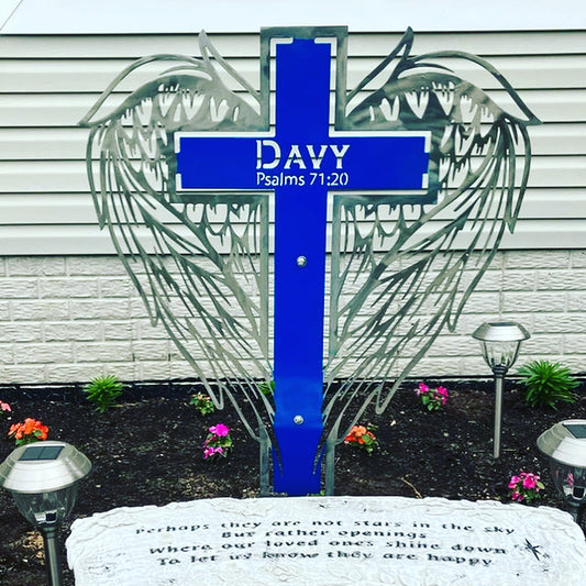 In Memory of Metal Wings Wrapping Around A Cross