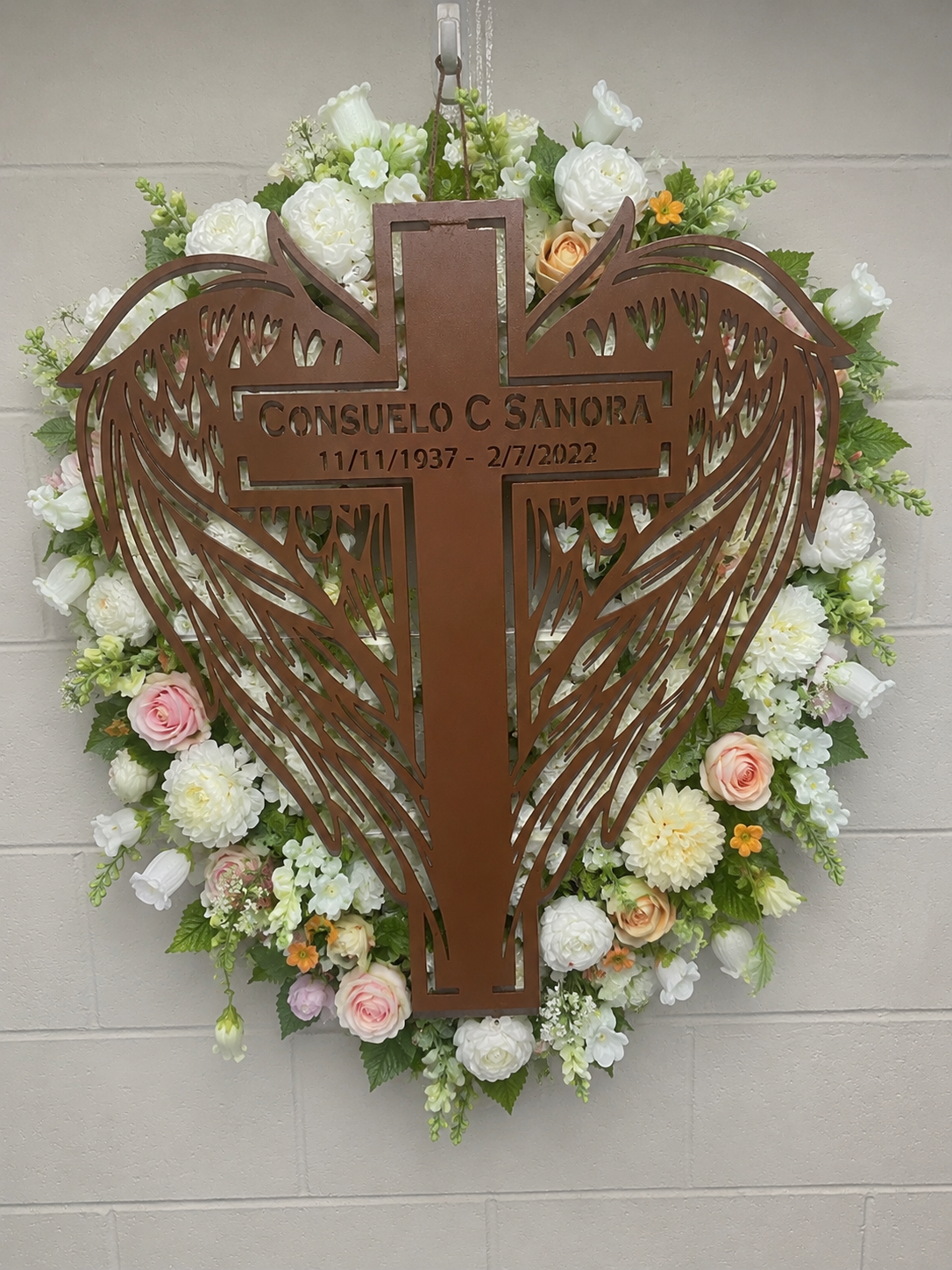 In Memory of Metal Wings Wrapping Around A Cross